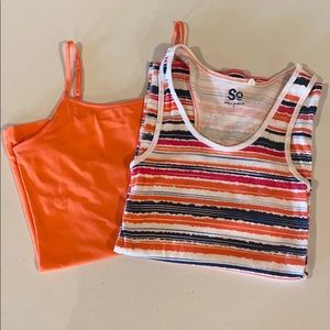 Two multicolored tank tops